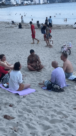 Beach gatherings and street traffic captured in Nha Trang