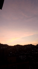 Dusk skyline captured over Caracas with colorful evening sky