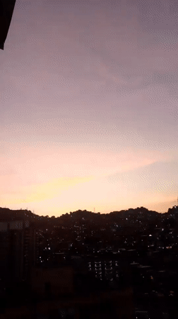 Dusk skyline captured over Caracas with colorful evening sky