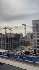 Construction, transit, and rooftops across Astana