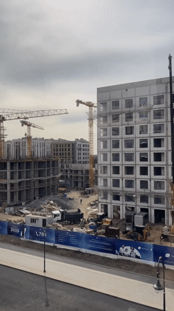 Construction, transit, and rooftops across Astana