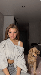 Woman and Cocker Spaniel captured in quiet domestic moment