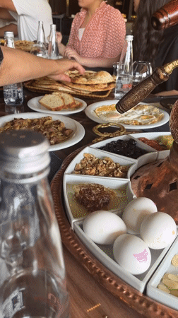 Leisurely group breakfast at an upscale outdoor restaurant