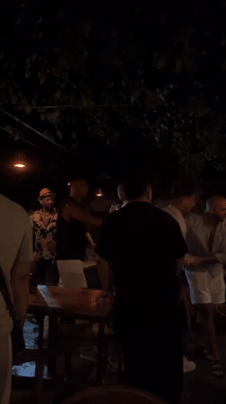 Evening social gathering recorded at Kuta Selatan restaurant patio