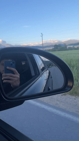 Car passenger documents rural journey near Blagoevgrad construction site