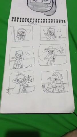 The image displays a page from a sketchbook featuring six individual drawings arranged in a two-column, three-row grid. Each drawing depicts a character, likely an anime-style girl, in various poses and settings.

In the top-left panel, a girl with dark hair and bangs is shown with a heart symbol floating near her head, suggesting affection or love. The top-right panel shows a girl with cat-like ears, holding a microphone and singing, with musical notes around her, indicating a performance or singing activity.

The middle-left panel features a girl in a dynamic pose, possibly dancing, with musical notes above her. The middle-right panel depicts a girl wearing a wide-brimmed hat and a scarf, with a stylized sun icon nearby, hinting at a sunny or outdoor setting.

The bottom-left panel illustrates a girl with a hood and a cape, surrounded by snowflakes, suggesting a winter or cold environment. The bottom-right panel shows a girl in a Santa hat, holding a glass, with long, flowing hair, possibly indicating a festive or celebratory mood.

The drawings are in black and white, executed with a pen or pencil. Some of the drawings have small "@malika" watermarks inscribed within them. Above the grid of drawings, the word "Anime" is written in cursive. The sketchbook itself has a spiral binding along the top edge. The background of the image shows a green surface, possibly a table or fabric, upon which the sketchbook is placed. There are no explicit location cues within the drawings themselves, other than general thematic suggestions of mood and environment. The overall tone of the drawings appears to be cheerful and expressive.
