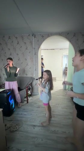 Russian families enjoy karaoke, home painting projects Saturday afternoon
