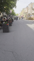 Outdoor dining scene captured on Montreal pedestrian street