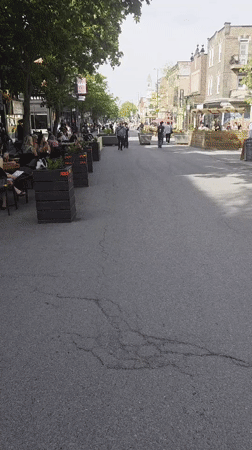 Outdoor dining scene captured on Montreal pedestrian street