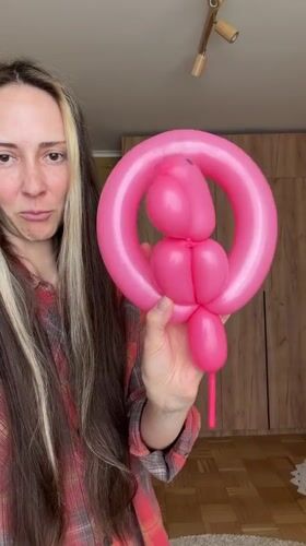 Pink flamingo balloon animal held in Khimki, Russia