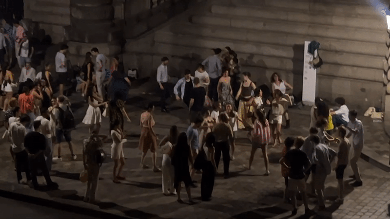 Late-night gathering along the Seine, Paris summer night