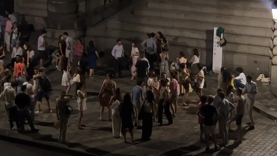Late-night gathering along the Seine, Paris summer night