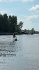 Man jet skis on lake in Shchelkovo, Russia