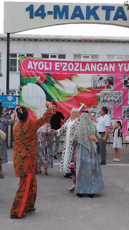 Traditional Uzbek dance and song at a community gathering in Angren