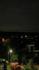 Bright circular object spotted above residential area at night