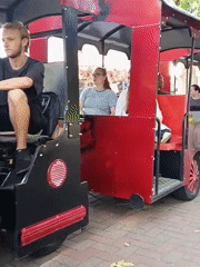Afternoon at a Hrodna amusement park, rides and walkways busy