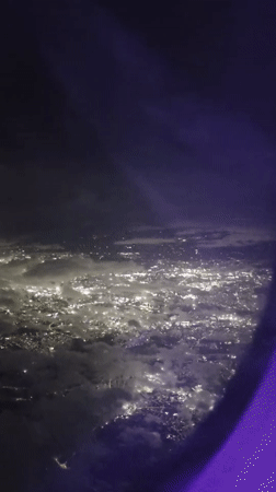 Lichfield glows from above on a cloudy summer night