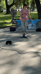 Woman performs marionette puppet show in Plovdiv park