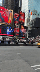 Evening street activity observed in Times Square
