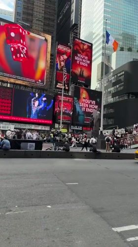 Evening street activity observed in Times Square