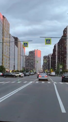 Evening street scene documented in Kudrovo, Russia