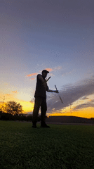 Nunchaku practice at sunset in a Karaganda park