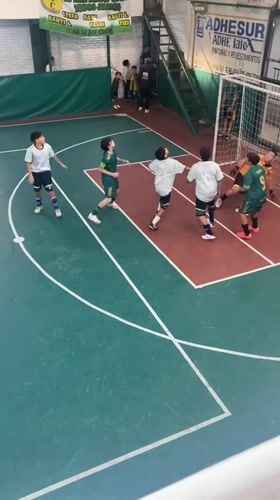 Youth indoor soccer matches played in Wilde, Argentina gymnasium