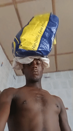 Nigerian nursing student documents study session with anatomy materials