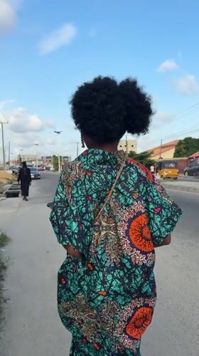 Street scenes captured near Esslink Bridge School in Ado