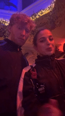 Couple records video selfie at London pub