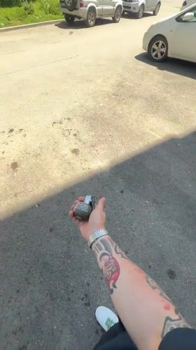 Individual with grenade observed in Vladivostok street scene