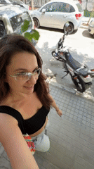 Woman documents Athens visit through selfies and street videos