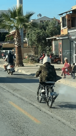 Routine street traffic documented near Migros supermarket in Fethiye