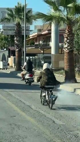 Routine street traffic documented near Migros supermarket in Fethiye