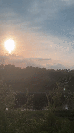 Dusk landscape filmed from vehicle near Yakhroma, Russia