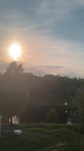 Dusk landscape filmed from vehicle near Yakhroma, Russia