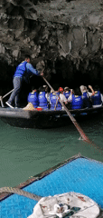 Morning boat tours navigate Ha Long Bay caves