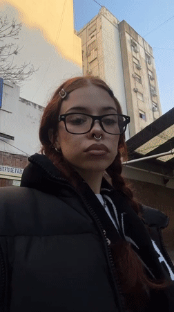 Red-haired person photographed on Buenos Aires street