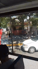 Bus passenger observes food truck area in Las Barrancas