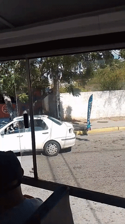 Bus passenger observes food truck area in Las Barrancas