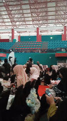 Women gather for indoor event in Pangongangan, Indonesia