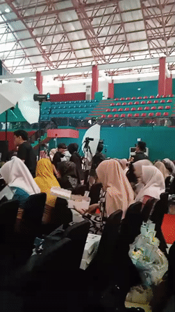 Women gather for indoor event in Pangongangan, Indonesia