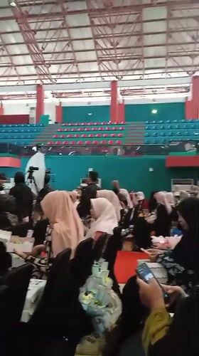 Women gather for indoor event in Pangongangan, Indonesia