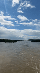 River flows past tree-covered islands near Kuragino, Russia