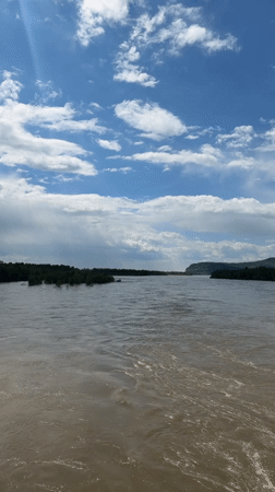 River flows past tree-covered islands near Kuragino, Russia