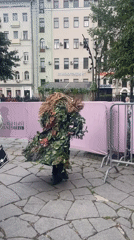 Elaborate nature costume and fountain scene in Moscow park
