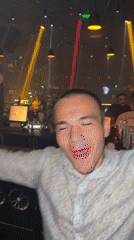 Man dances at crowded nightclub in Varna, Bulgaria