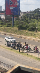 Crowd disturbance involving motorcycles disrupts Nairobi intersection traffic