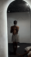 Man takes mirror selfie in Bukuru, Nigeria