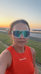 Woman in branded tank top runs in Chaikovsky, Russia